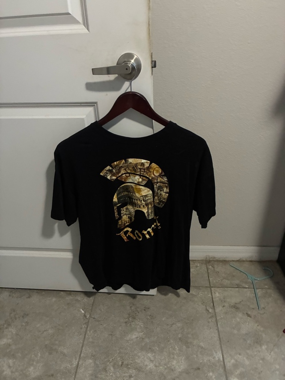 Ada Black Short Sleeve Tee with Metallic Gold Roman Helmet Graphic